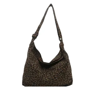 Large leopard print hobo bag with adjustable strap for women in high-capacity canvas style
