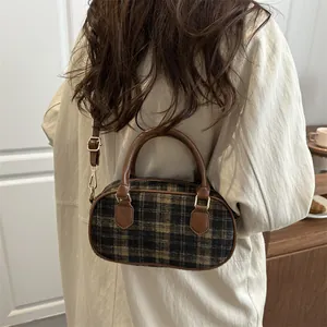 Vintage plaid tweed boston bag for women with leather straps and gold metal hardware