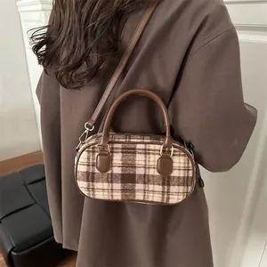 Retro plaid wool Boston bag with brown leather trim and adjustable crossbody strap