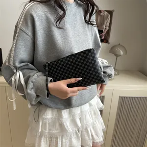 Fashionable black printed crossbody clutch bag with geometric pattern for women's daily wear