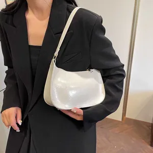 French retro white underarm bag in glossy faux leather with gold zipper for women