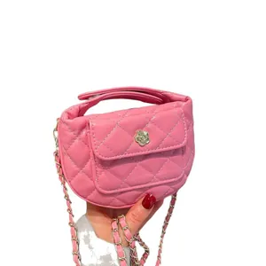 Pink quilted PU leather mini handbag with camellia gold buckle and metal chain strap