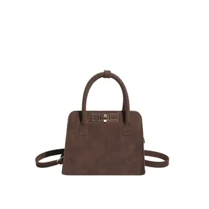 Retro dark brown crossbody handbag with top handles and a metal lock for women