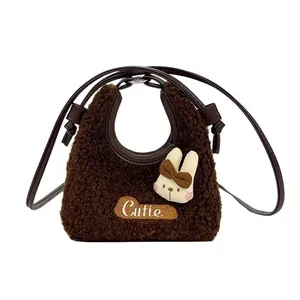 Brown fluffy lamb wool crossbody bag with cute rabbit head detail and Cutie embroidery