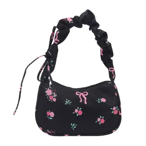 Minimalist black baguette bag with pink floral rose and bow prints for women