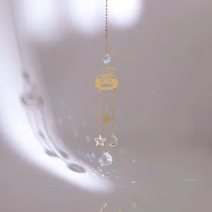 Goldener Halloween-Kürbis Sonnenfänger mit Mond Sternen und facettierter Kristallkugel