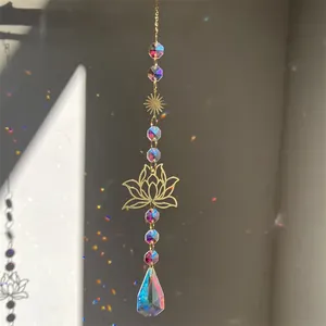 Detailed suncatcher view with gold lotus elements and rainbow crystal light reflection