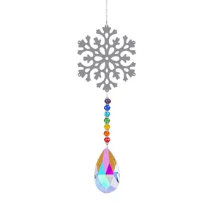 Detail of snowflake suncatcher with rainbow beads and crystal prism teardrop