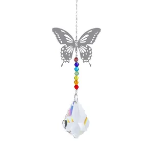 Detail of butterfly suncatcher with rainbow crystal beads and faceted prism pendant