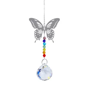 Detailed view of silver metal butterfly suncatcher with rainbow beads and crystal prism ball