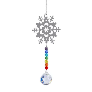Detail of snowflake suncatcher with rainbow crystal beads and faceted glass ball