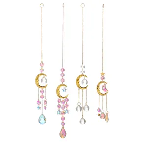 Set of four gold crystal suncatchers with moon and star prisms for window garden decoration