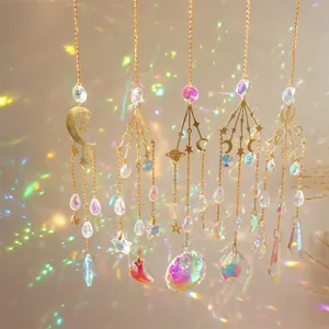 Detailed view of suncatcher prisms reflecting colorful rainbow patterns on wall