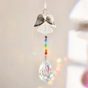 Close-up of metal angel suncatcher with rainbow beads and faceted crystal drop