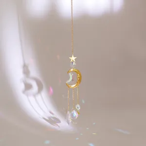 Golden moon and star crystal suncatcher with faceted prisms for rainbow light effects