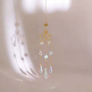 Golden sun and moon crystal suncatcher hanging ornament with rainbow galaxy star prisms