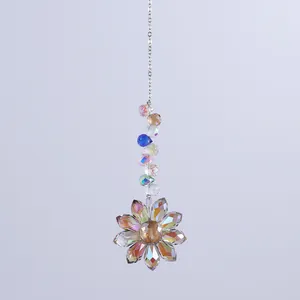 Detail of crystal sunflower suncatcher with multi-colored beads and rainbow petal pendant