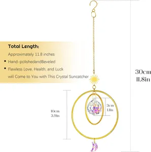 Detail of crystal suncatcher with golden sun and moon pendants showing precise dimensions