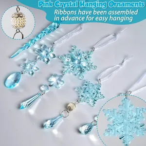 Detail of light blue acrylic snowflakes and icicles with pre-installed white hanging ribbons