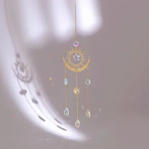 Large sun and moon crystal suncatcher with golden metal moon phase and star prism pendants