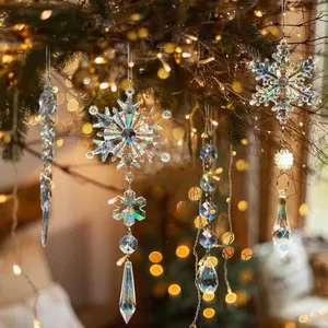 Iridescent acrylic snowflake and icicle ornaments hanging on a festive Christmas tree