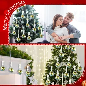 Sparkling crystal suncatchers with prisms hanging on a Christmas tree for holiday decor