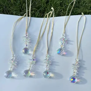 Detailed macro view of 6pcs crystal suncatcher pendants with faceted prism spheres