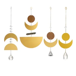 Set of 4 golden brass moon phase suncatchers with crystals and geometric wood accents