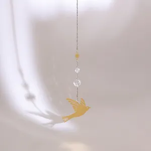 Goldene Metallvogel-Deko mit Sonnenanhängern und Kristallperlen für nordische Wände