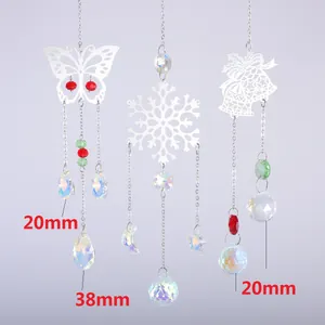 Detail view of crystal suncatchers with metal butterfly, snowflake and bell motifs