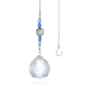 Detail of 30mm crystal ball prism suncatcher with blue beads and silver S-hook for garden
