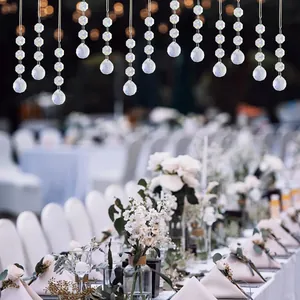 Close-up of AB coating crystal teardrop prisms hanging for wedding party decoration