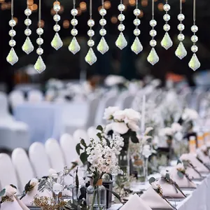 Macro detail of clear teardrop crystal prisms with AB coating for wedding chandelier decoration