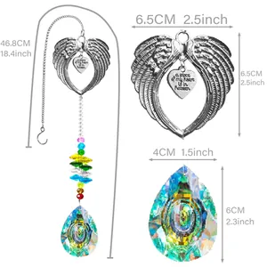 Angel wings suncatcher with heart charm and faceted crystal teardrop pendant