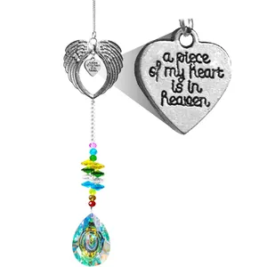 Detail of angel wing heart frame with colorful beads and crystal teardrop suncatcher