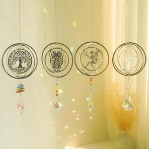Set of 4 metal 3D rotating suncatchers featuring tree of life owl fairy and hummingbird