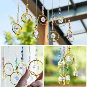 Detail of 7-piece crystal sun catcher set with natural crushed stones and prism ball