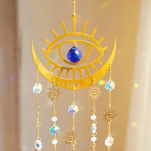 Golden Evil Eye suncatcher with blue crystal and moon crescent for home garden decor