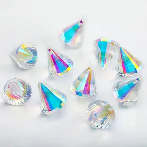 Detailed macro of AB coated crystal prism pendants with faceted rainbow light reflections