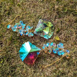 Macro detail of rainbow crystal suncatcher pendants with faceted colorful glass prisms