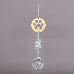 Gold cat paw suncatcher with rainbow crystals and multi-faceted clear glass pendant