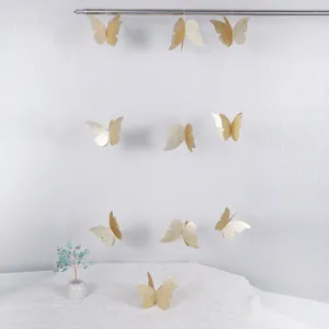 Guirnalda de mariposas doradas brillantes de doble capa para bodas y decoración de pared