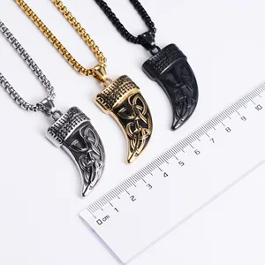 Detail view of Celtic knot pattern pendant showing dimensions next to a ruler tool