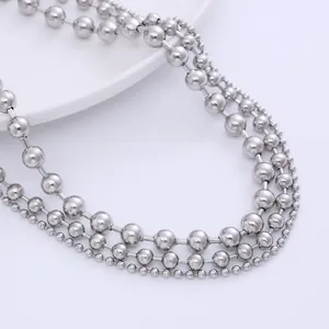 Three-layer silver stainless steel ball chain necklace with polished beads of various sizes