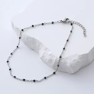 Bohemian silver stainless steel anklet with small black beads and lobster clasp closure