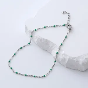 Bohemian silver stainless steel anklet featuring vibrant green enamel beads and lobster clasp