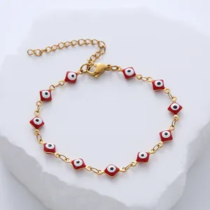 Gold plated stainless steel bracelet with red evil eye square enamel charms and lobster clasp