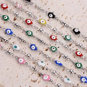 Stainless steel Hamsa Hand necklace with colorful evil eye enamel charms on a chain
