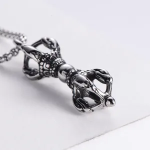 Vintage stainless steel Vajra pestle pendant necklace with intricate religious carvings