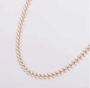 Collana a foglia di grano in acciaio inossidabile dorato con smalto bianco donna